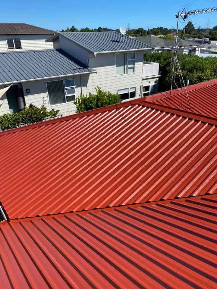 Roof painting — red iron roof