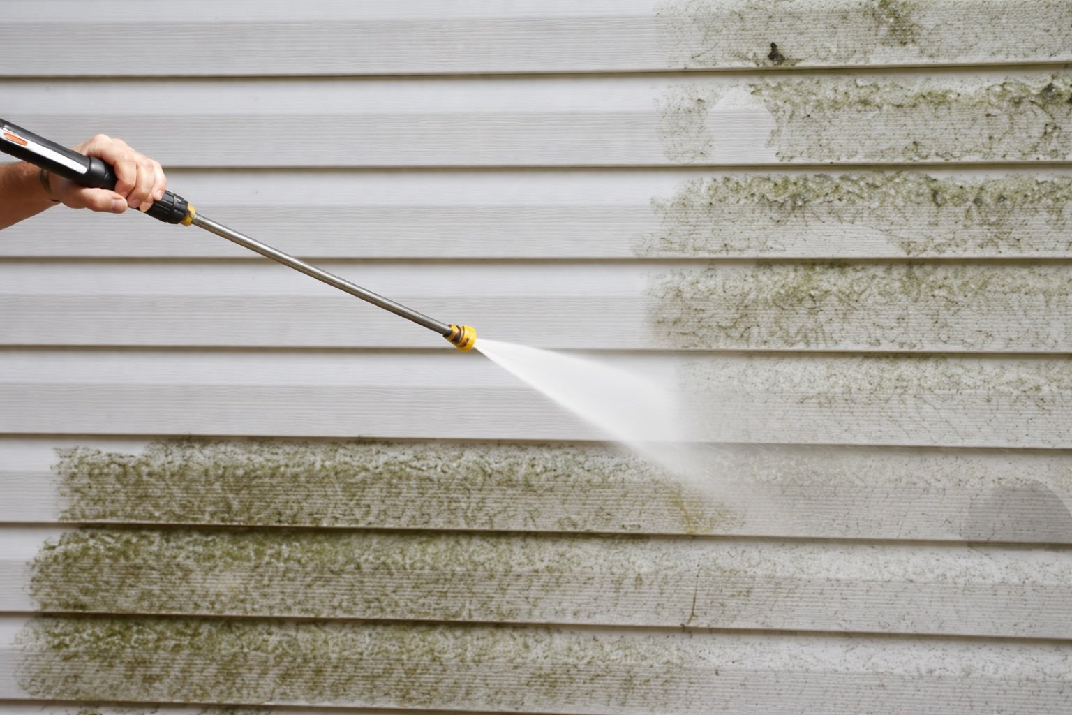 Water blasting — clean driveway